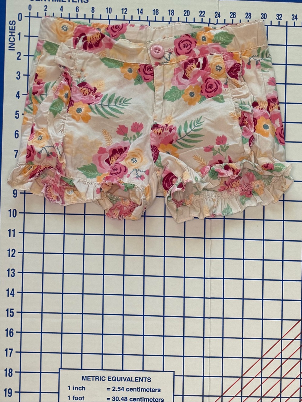 Ruffle Butts Cream Floral Ruffle Shorts